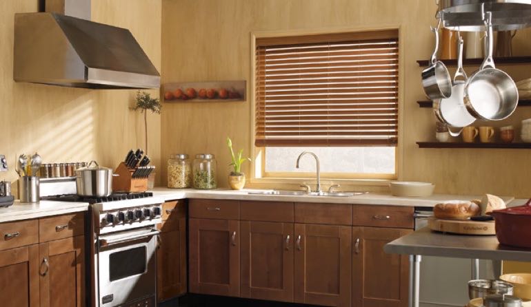 Bluff City kitchen faux wood blinds.